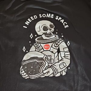 Chic Black Tee with Astronaut Graphic